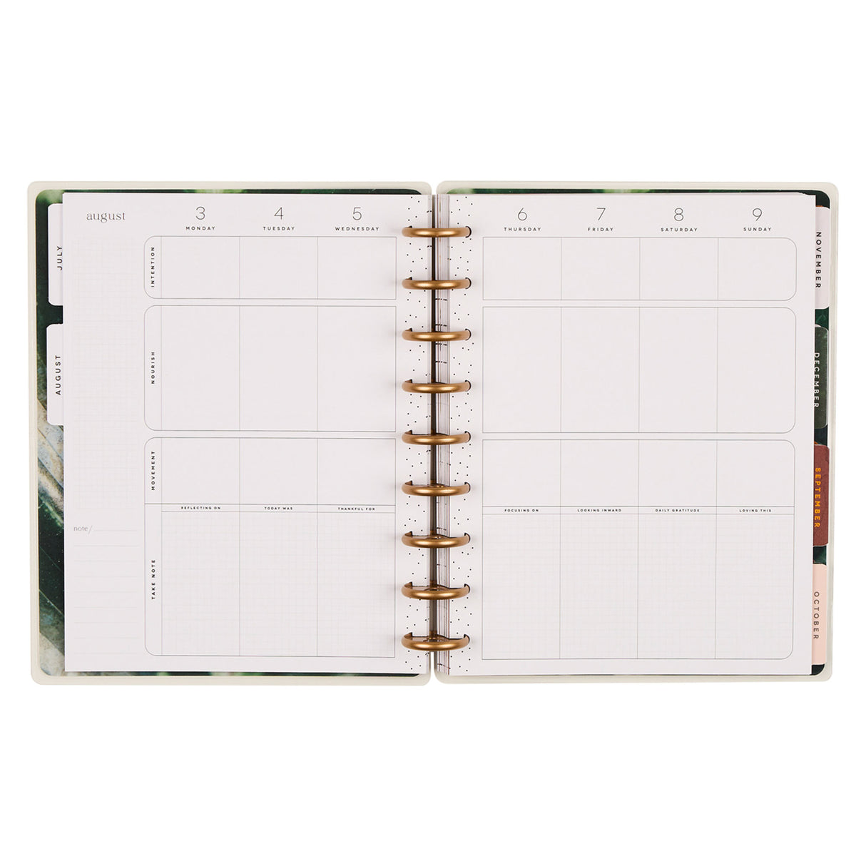 Open planner with weekly layout on white background