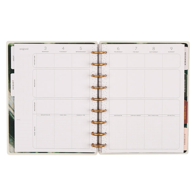 Open planner with weekly layout on white background