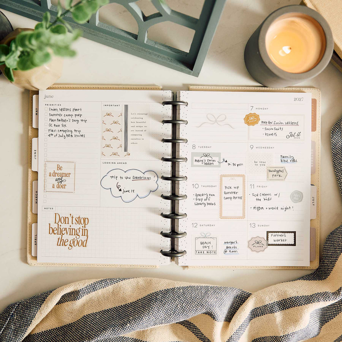 Haven & Heart planner open with handwritten notes and decorative stickers