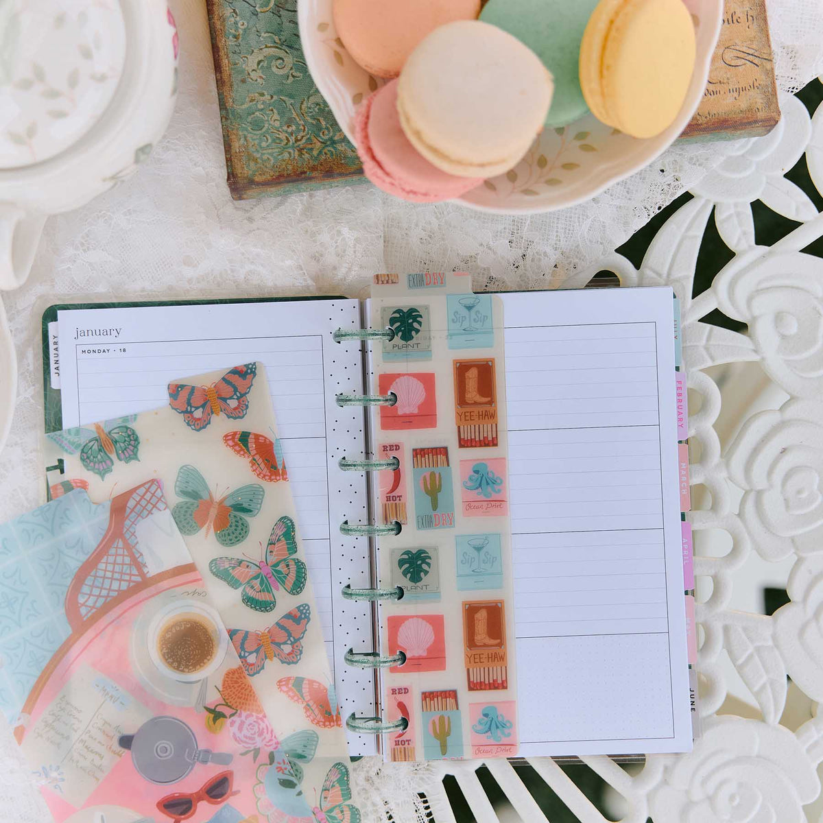 Life In Whimsy Mini dashboard in a disc-bound planner with butterfly artwork and lined pages