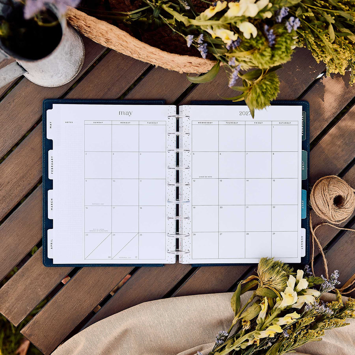 Happy Planner Wildflower Daydream Classic Dashboard Planner 2027 - floral monthly dashboard spread on a wooden table