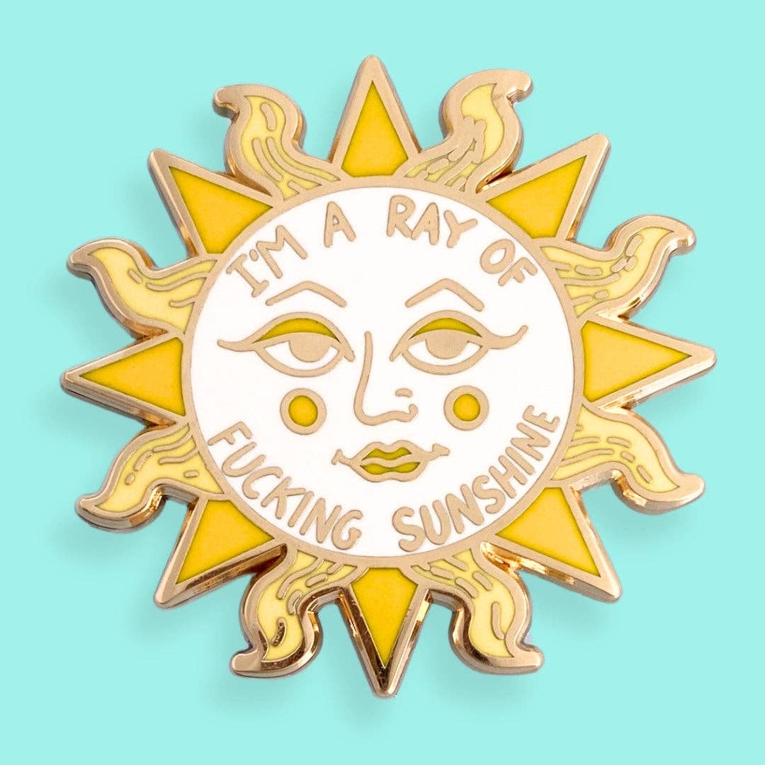 I'm A Ray Of Fucking Sunshine Lapel Pin gold-plated hard enamel lapel pin with a sun and rays design, featuring the text 'I'm a ray of fucking sunshine'.