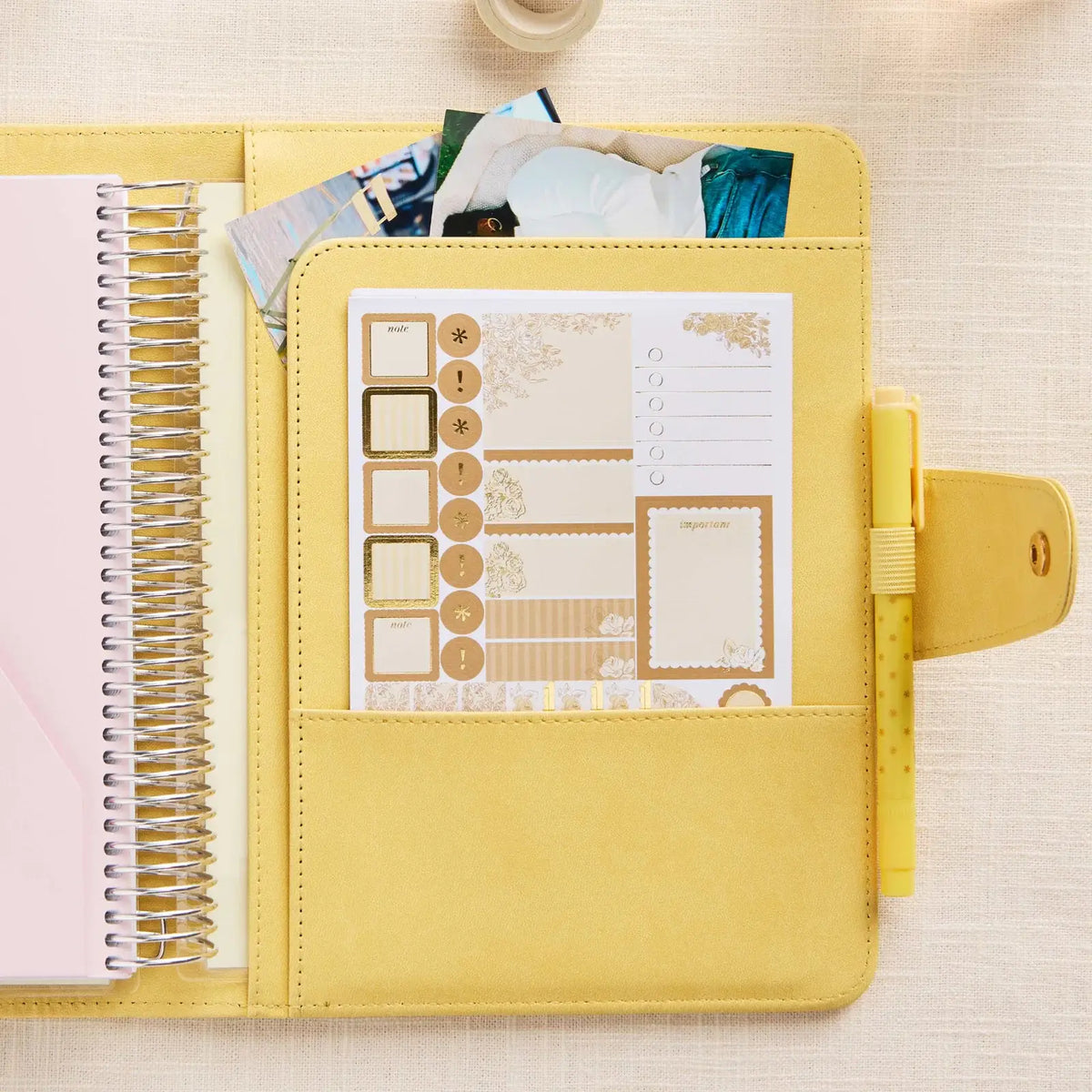 Erin Condren planner folio: Butter folio with planning supplies in its storage pocket