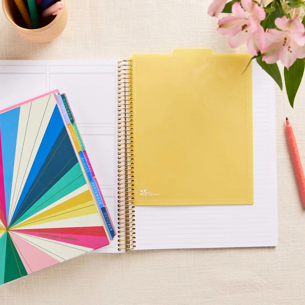Erin Condren snap-in dashboard: Yellow pocket dashboard snapped into an open book