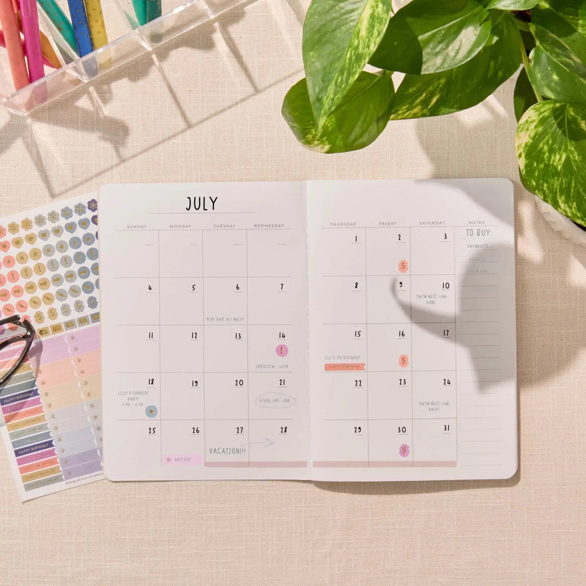 Erin Condren Petite Planner: Monthly calendar with handwritten dates