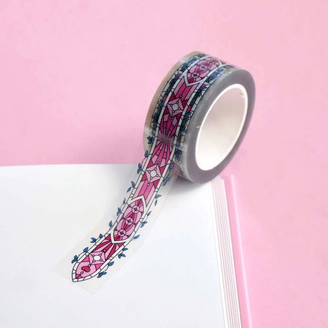 Kiss & Tell Washi Tape with pink and blue pattern on a pink background