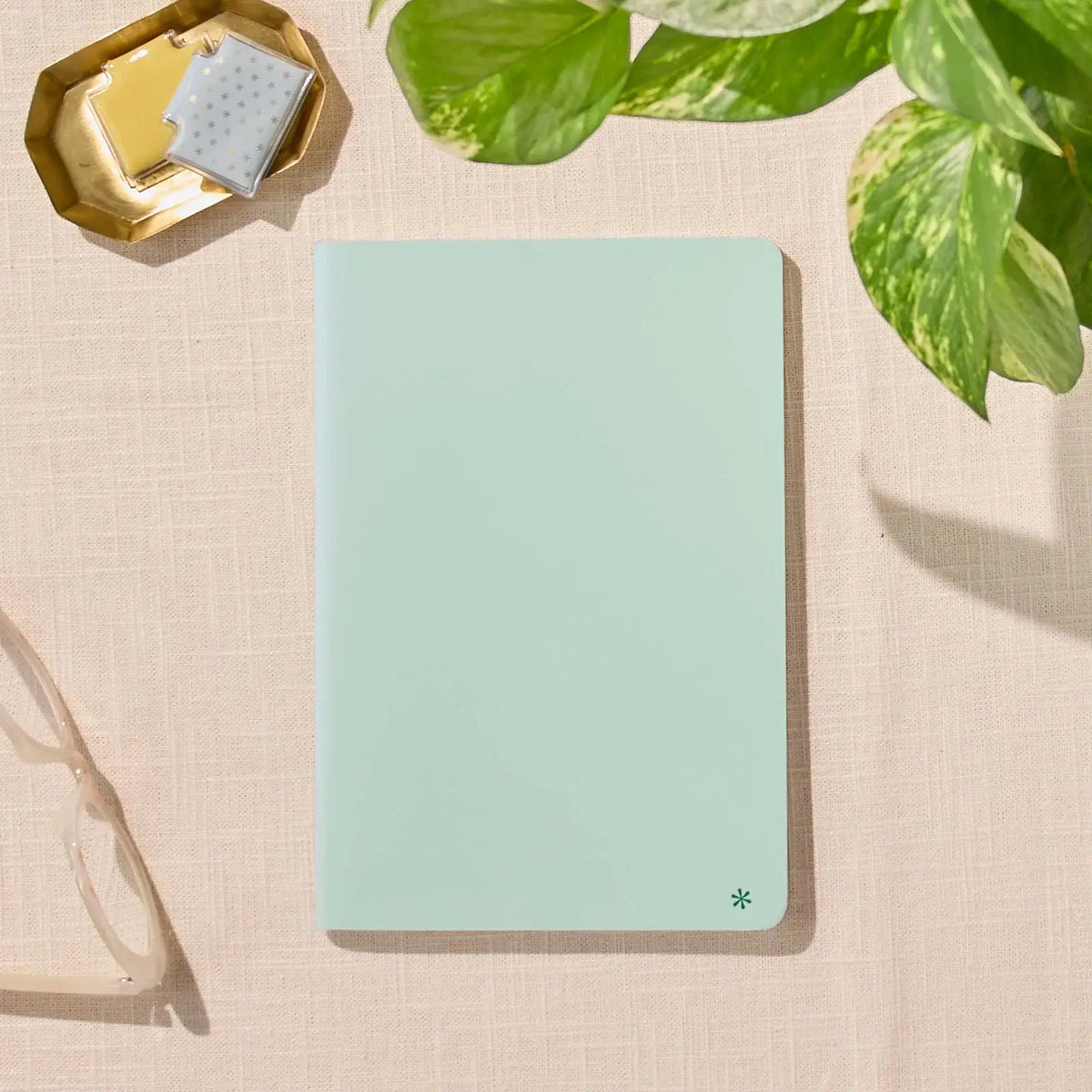 Erin Condren Petite Journal: Closed Pool journal on a desk