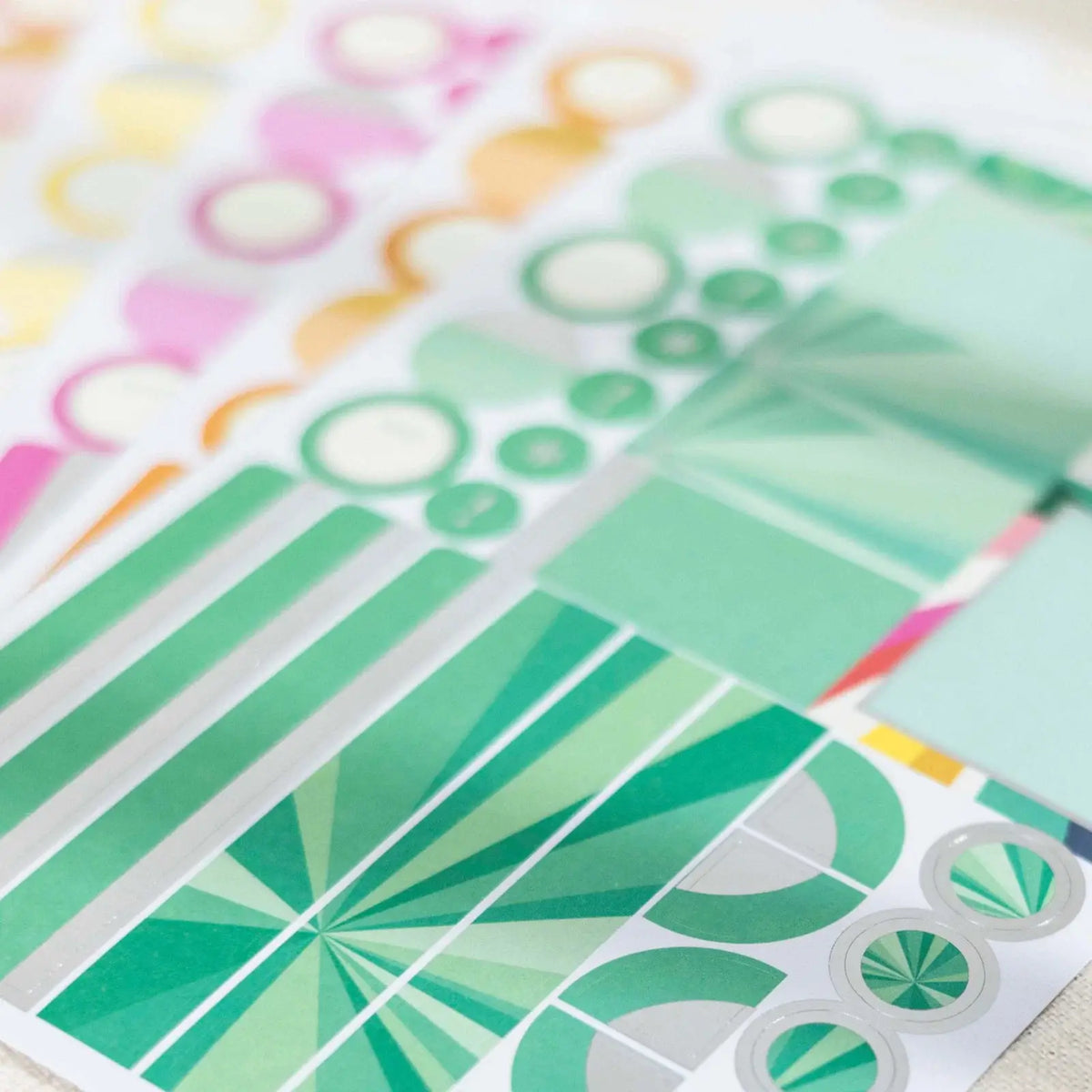 Erin Condren sticker book: Close-up of green geometric and functional stickers