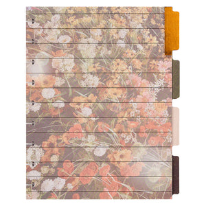 Floral patterned notebook with wooden cover on a white background