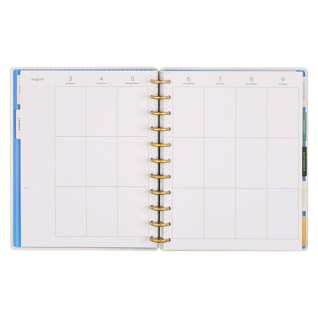Open planner with daily grid layout on white background