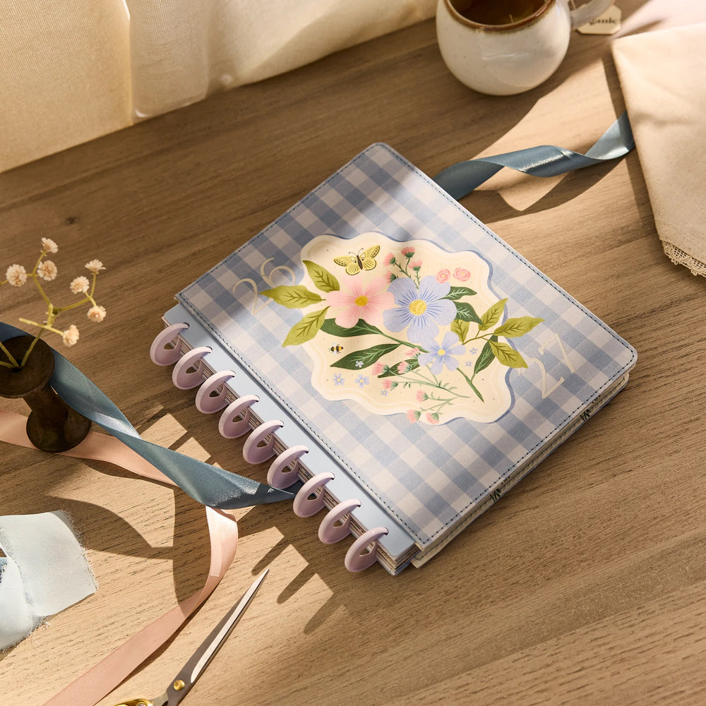 Happy Planner 2026 - 2027 Country Charm Classic Horizontal 12 Month Dated planner with floral design on a wooden surface