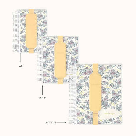 Erin Condren pen holder: Pen holder shown attached to books of different sizes