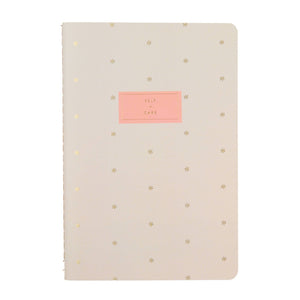 Erin Condren Self Care Journal Petite Planner - Asterisk Beige notebook with gold star patterns and a pink label on a white background
