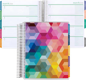 Erin Condren 7x9 Hexagon Horizontal Life Planner - 12-month Dated 2026 Jan - Dec Colourful geometric-patterned planner with open pages showing a monthly calendar.