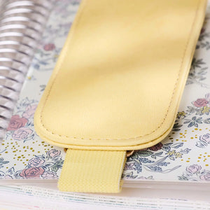 Erin Condren pen holder: Close-up of stitched vegan leather pocket and elastic band