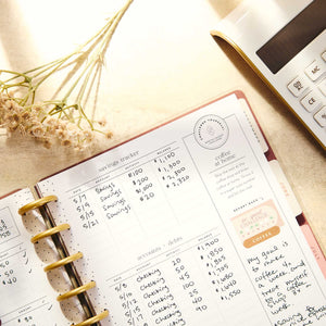 Amber & Oak Budget Planner savings tracker and coffee at home pages with gold discs