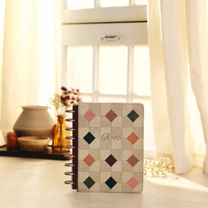 Happy Planner Amber & Oak Classic Dashboard Planner 2027 - geometric cover on a sunlit desk