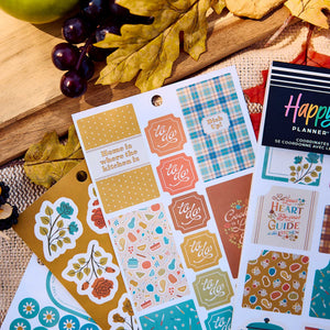 Close-up of Fall Picnic Meal Planning sheets with cooking quotes, floral designs and plaid planning boxes