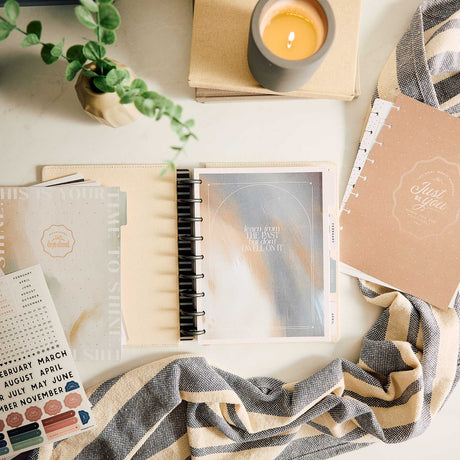 Modern Balance extension pages in a disc-bound planner with calendar, stickers and coffee