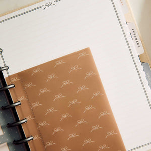 Haven & Heart lined pages with a patterned brown divider and monthly tabs