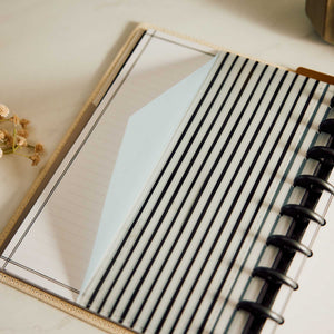Haven & Heart lined filler paper with black discs and a striped divider
