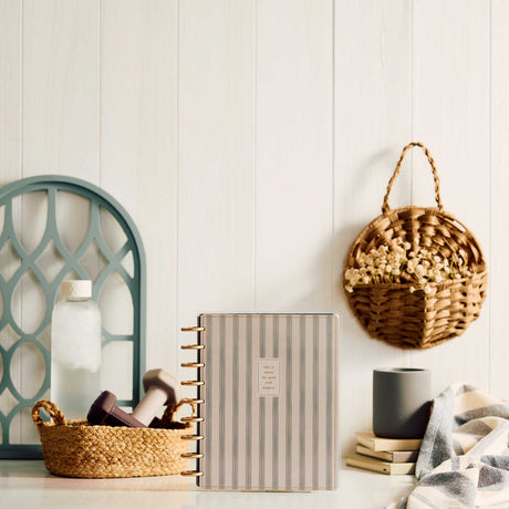Haven & Heart striped disc-bound journal displayed on a shelf