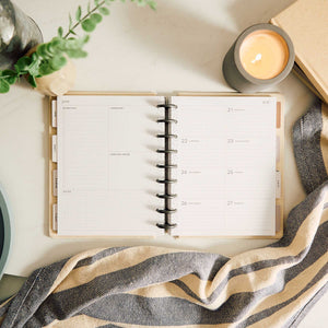 Haven & Heart planner weekly Dashboard spread on a neutral desk