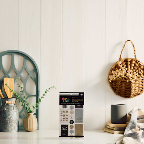 Haven & Heart sticker book on a tabletop with home decor and a woven wall basket