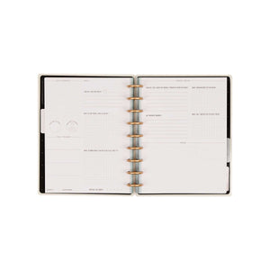 Open Haven & Heart journal with workout and goal prompts