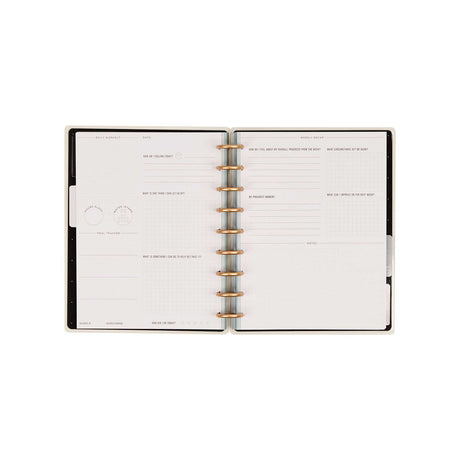 Open Haven & Heart journal with workout and goal prompts