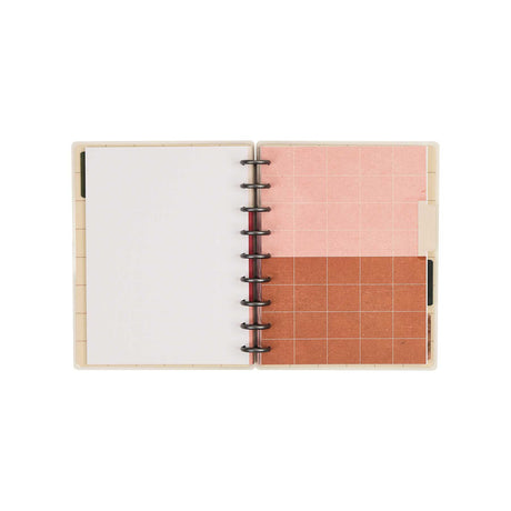 Open Amber & Oak journal with a writing page and colour-blocked budget grids