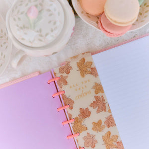 Seasonal Sidewalks autumn bookmark with orange leaves in a pink disc-bound planner