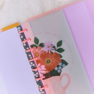 Petal Press floral pages with pink discs and lavender details