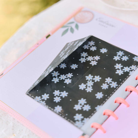 Petal Press black floral dashboard in a lavender discbound planner