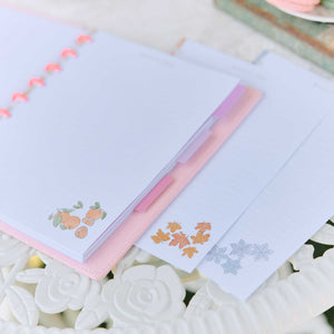 Seasonal Sidewalks pastel floral pages in a disc-bound planner