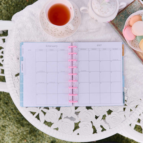 Happy Planner Life In Whimsy Classic Lined Vertical Planner 2027: February monthly pages beside tea and macarons