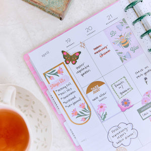 Happy Planner Hive & Bloom Classic Vertical Planner 2027: Written weekly spread with floral and bee stickers
