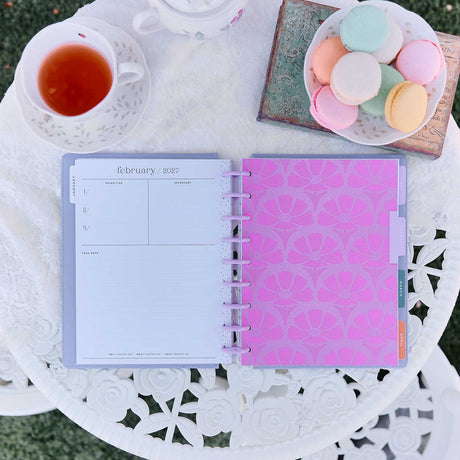 Happy Planner Hive & Bloom Classic Dashboard Planner 2027 - February dashboard beside a pink floral divider