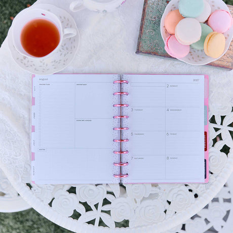 Happy Planner Deluxe Seasonal Sidewalks pastel weekly spread and seasonal planning pages