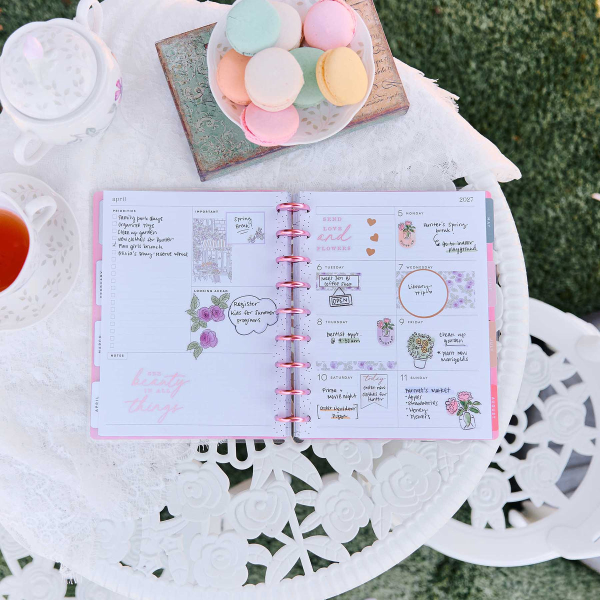Seasonal Sidewalks Classic planner pastel monthly pages with floral stickers and handwritten plans