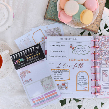 Seasonal Sidewalks Big sticker sheets beside an open planner with autumn layouts and handwritten plans