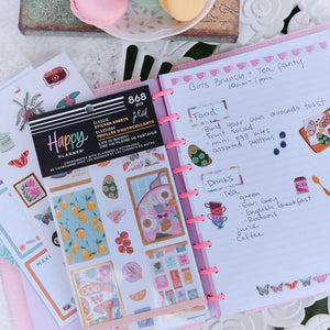 Life In Whimsy sticker book on a pink disc planner decorated with butterflies and a tea party checklist