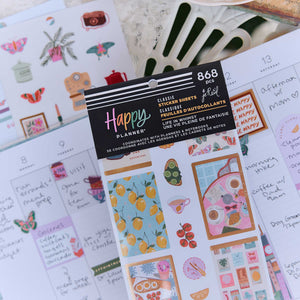 Life In Whimsy sticker book with lemon and food designs on a decorated weekly planner spread