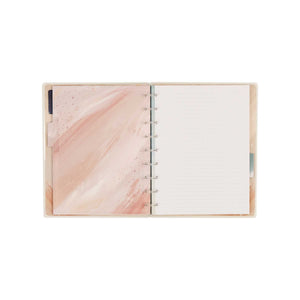 Open Starlit Glow notebook with a pink marbled interior cover and dotted-lined pages