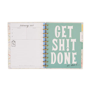 Pajama Plans Big planner open to a February 2027 spread and teal dashboard page