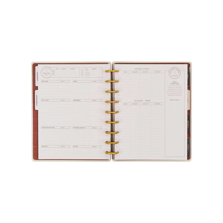 Amber & Oak monthly budget pages with gold discs and structured planning sections