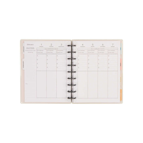 Hushed Hues open planner spread with spacious planning sections and disc binding