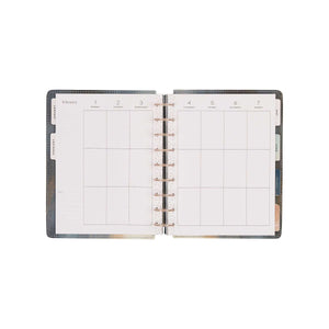 Starlit Glow Classic planner calendar spread with spacious dated boxes