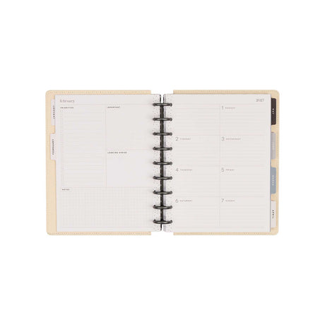 Haven & Heart 2027 planner open to a weekly Dashboard spread with monthly tabs