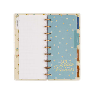 Fall Picnic Skinny Classic planner open with a blue floral page and monthly tabs